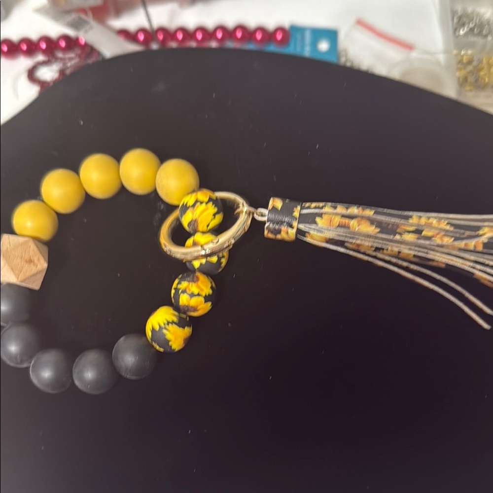 Yellow and Black Beaded Bracelet with Tassel
